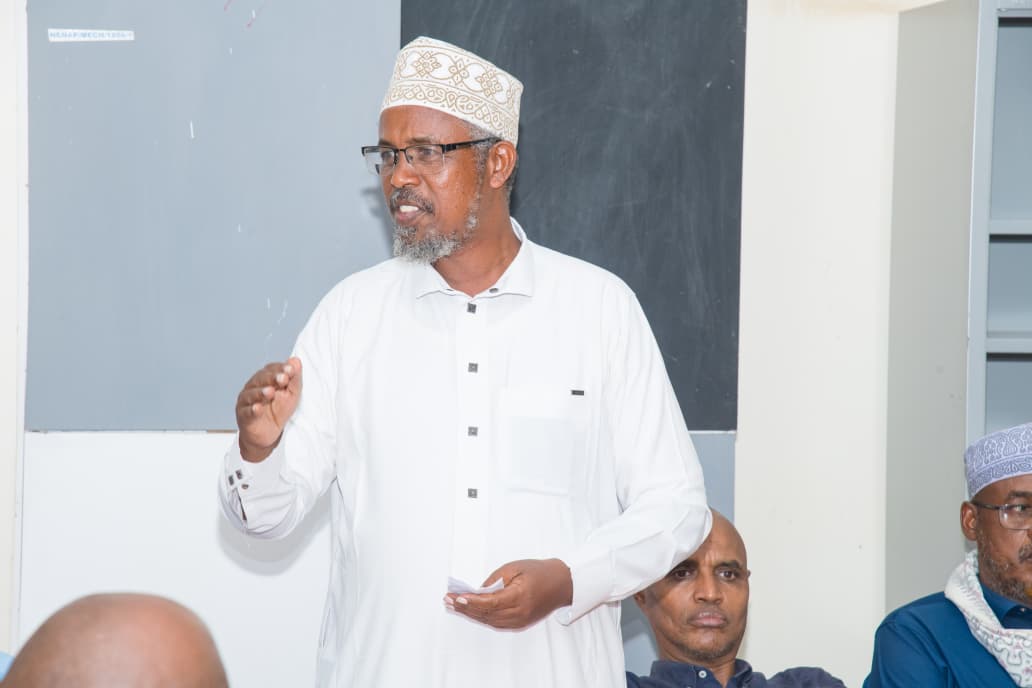 Principal addressing visitors